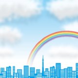 街の空に虹がかかってるイラスト